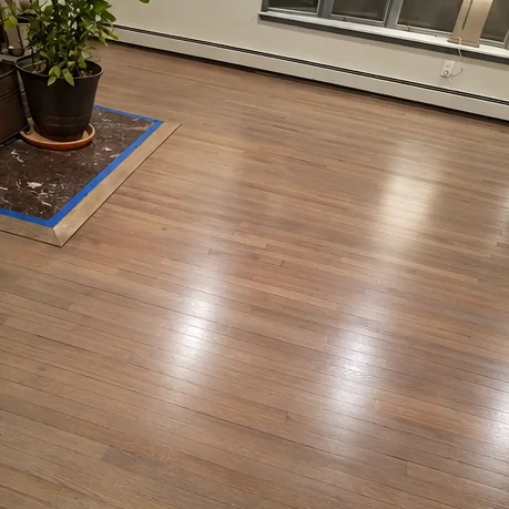 Kitchen and living room floors sanded and finished
