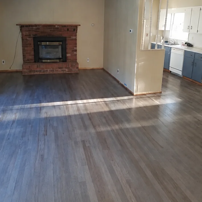 Living room floor sanded and stained antique gray